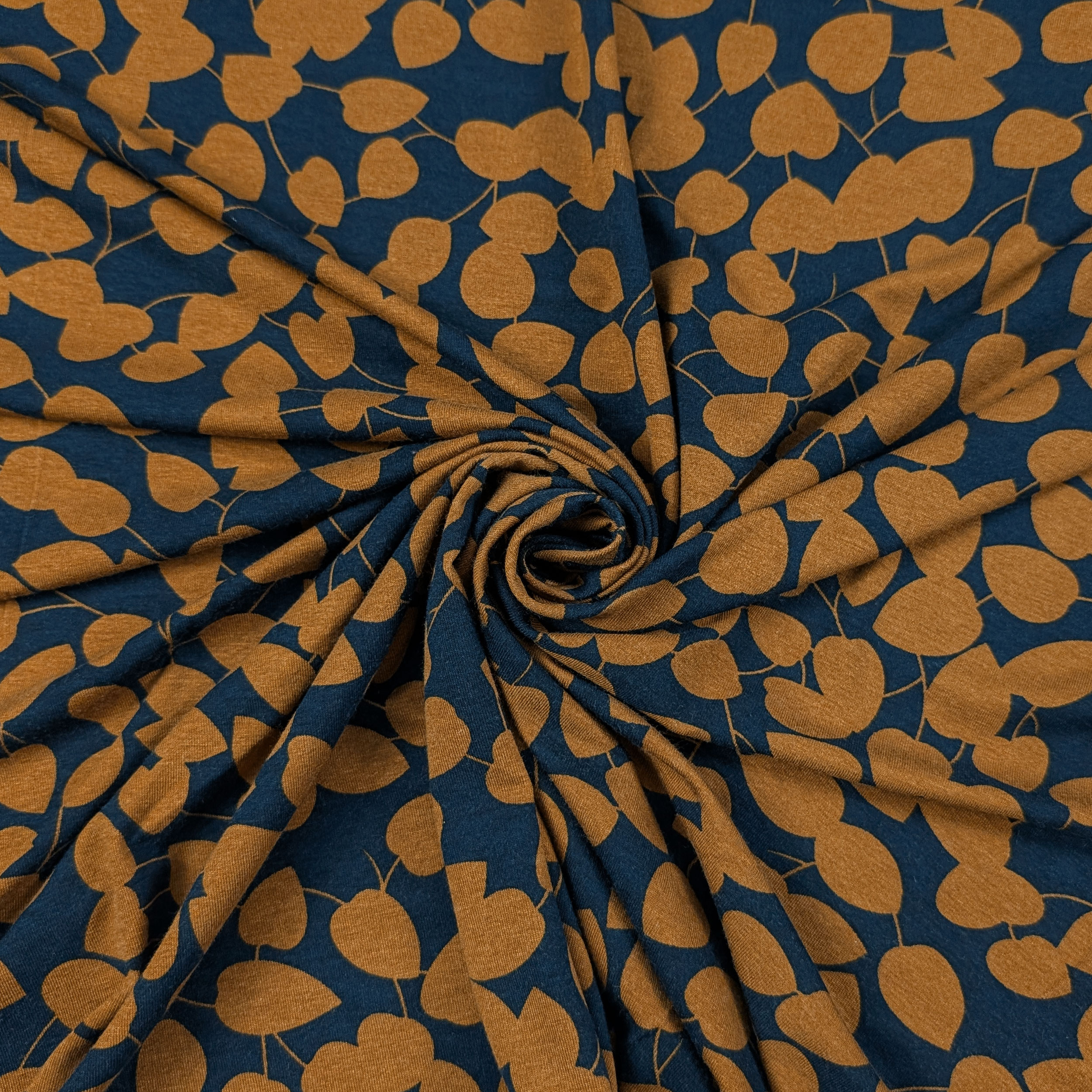 Jersey Cotone Foglie Ocra Sfondo Blu Image