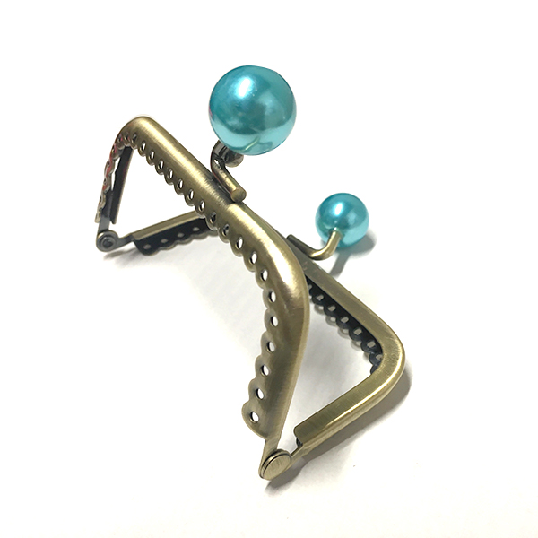 click-clack-bronzo-reattangolare-perle