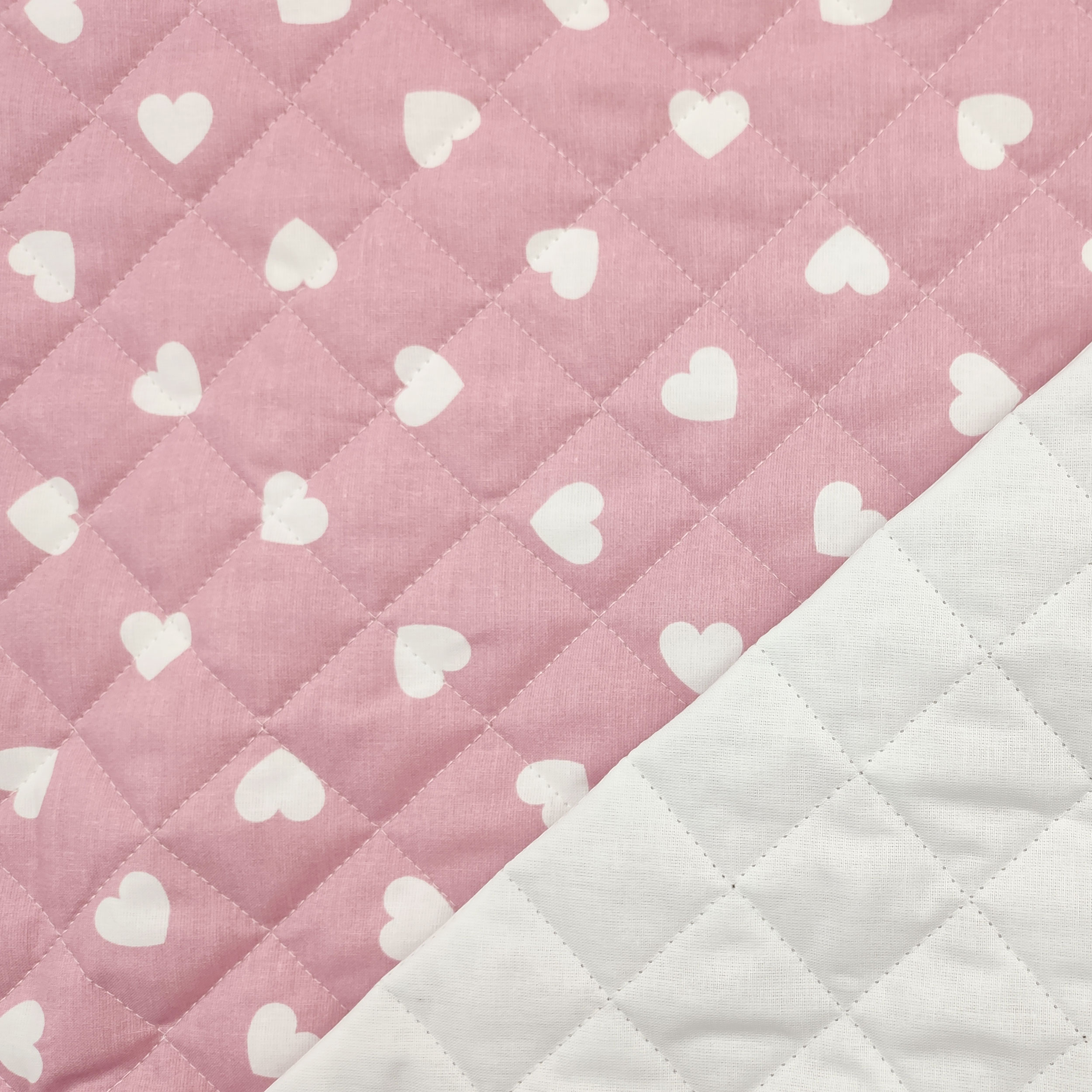 Tessuto Trapuntato Cuori Sfondo Rosa