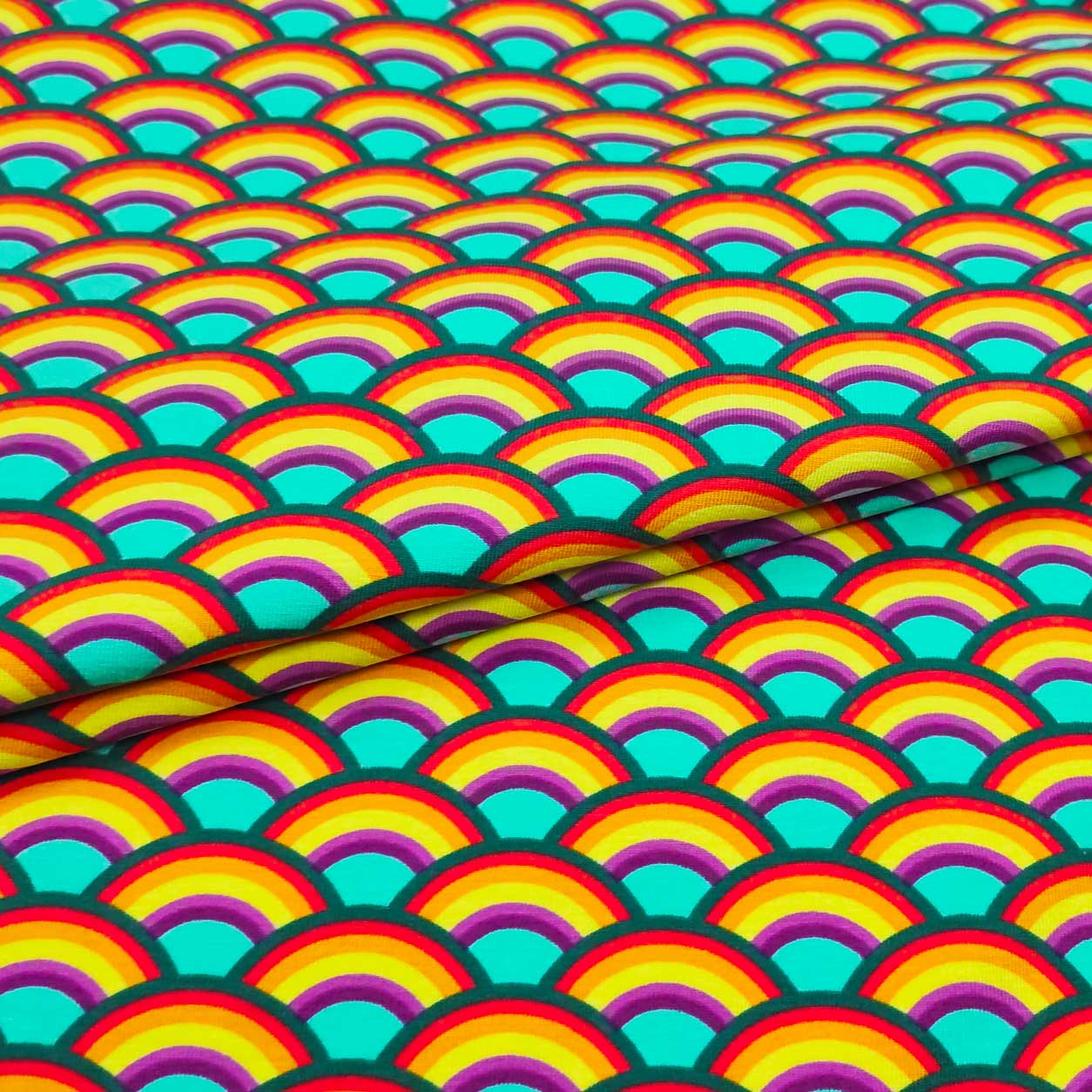 maglina in cotone arcobaleni sfondo turchese
