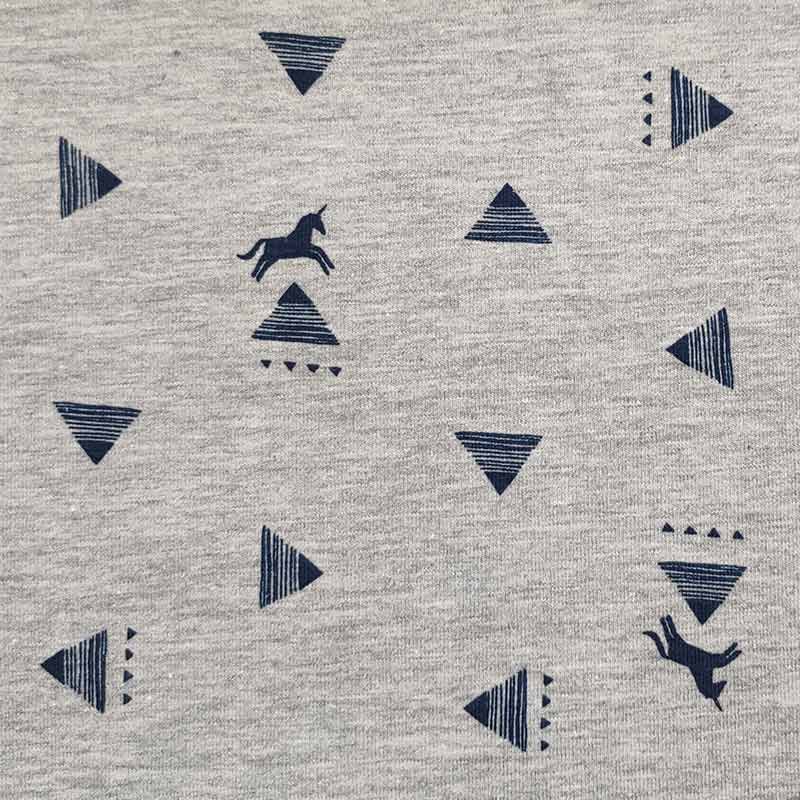 Tessuto Jersey Grigio Melange con Unicorni e Geometrie