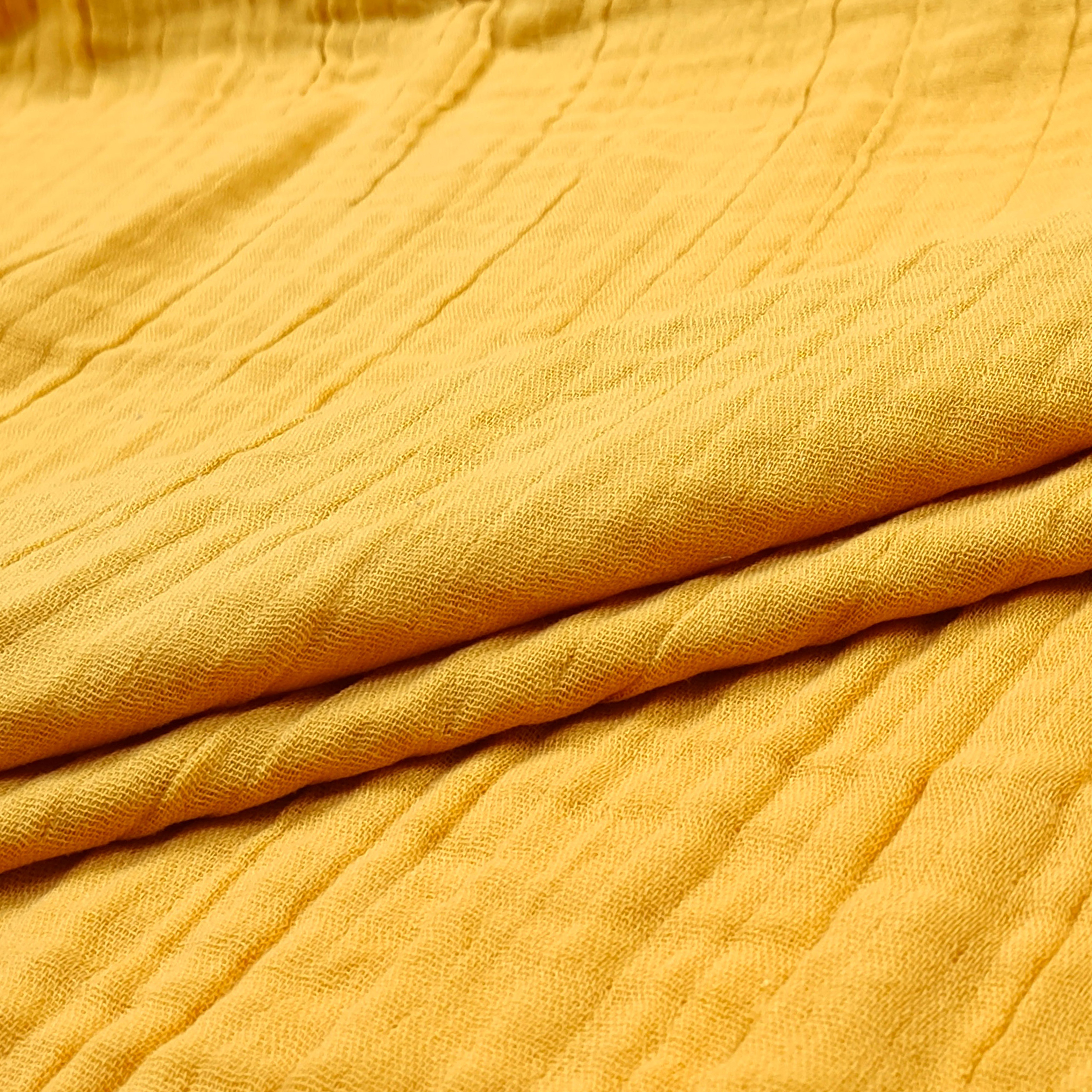 tessuto tripla mussola gialla 
