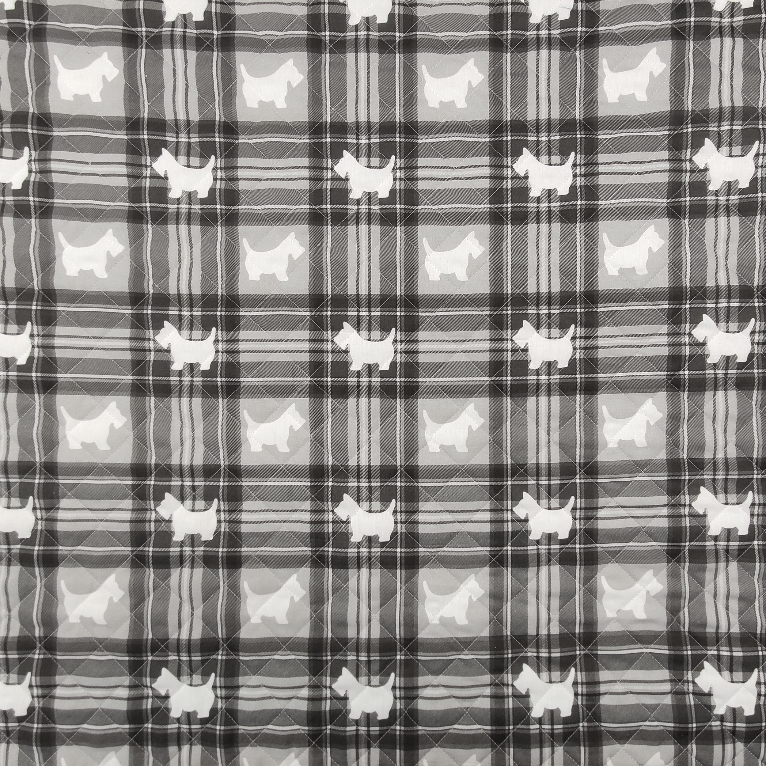 trapuntato-con-cagnolini-sfondo-tartan