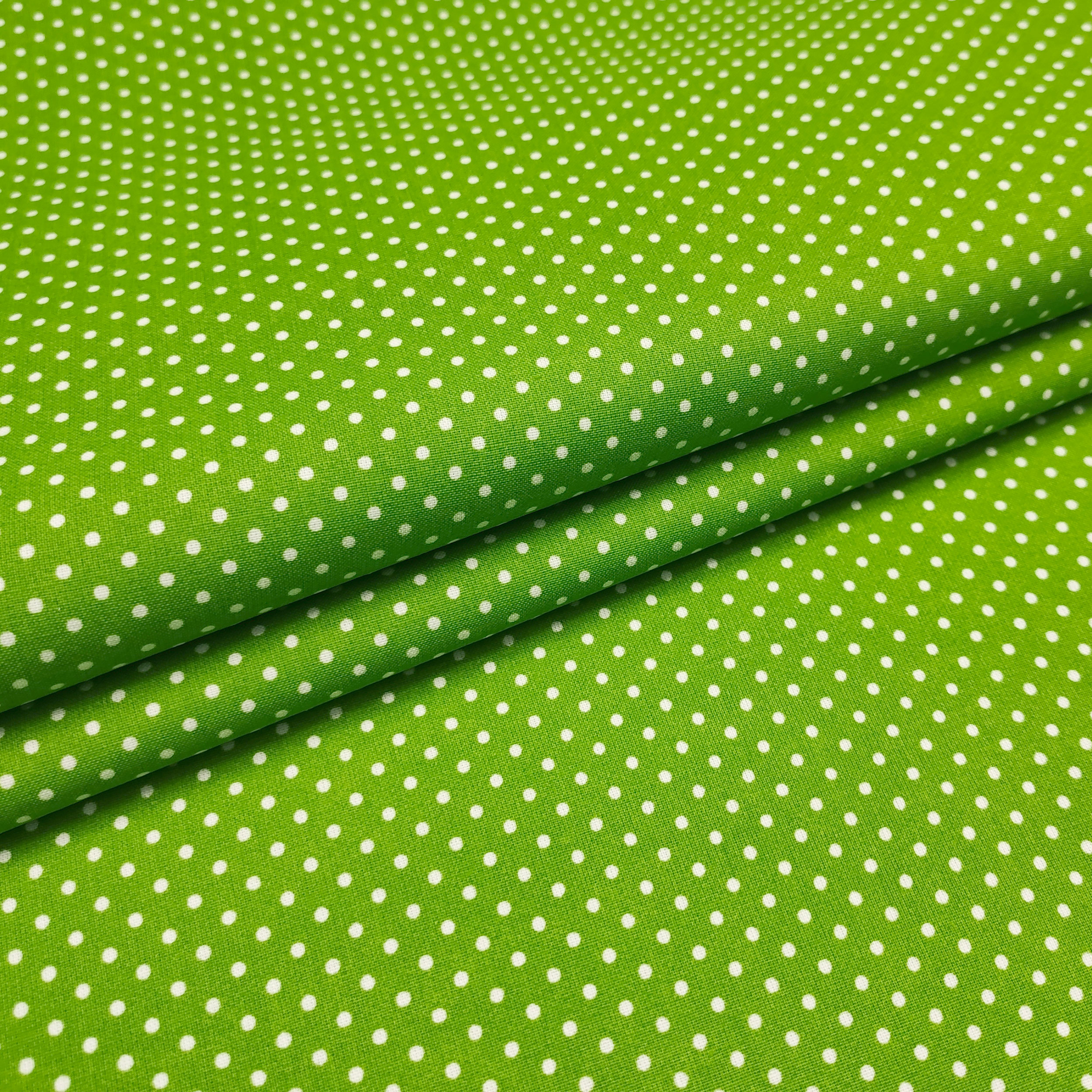 tessuto cotone pois sfondo verde