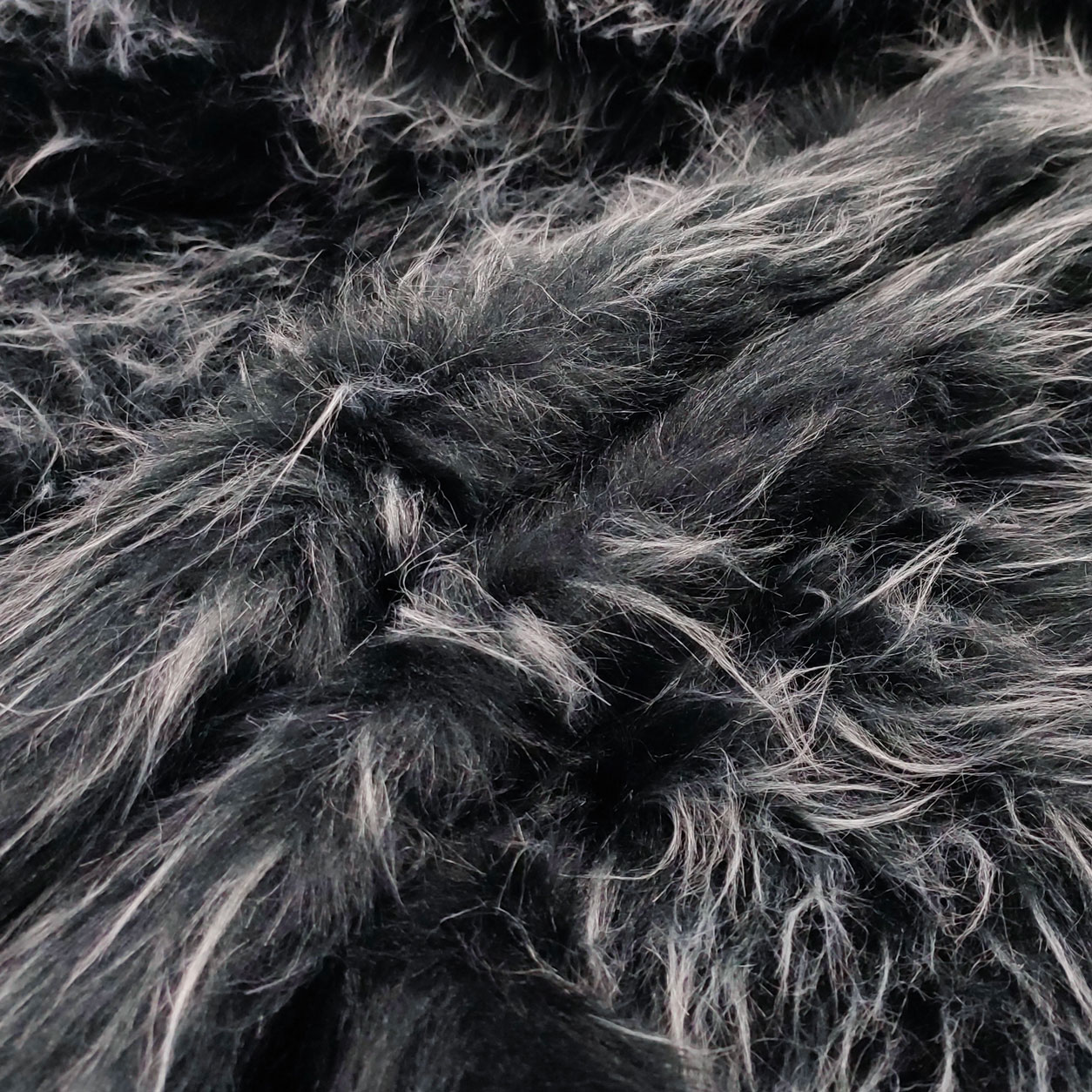 Pelliccia finta tessuto pelo nero bianco grigio