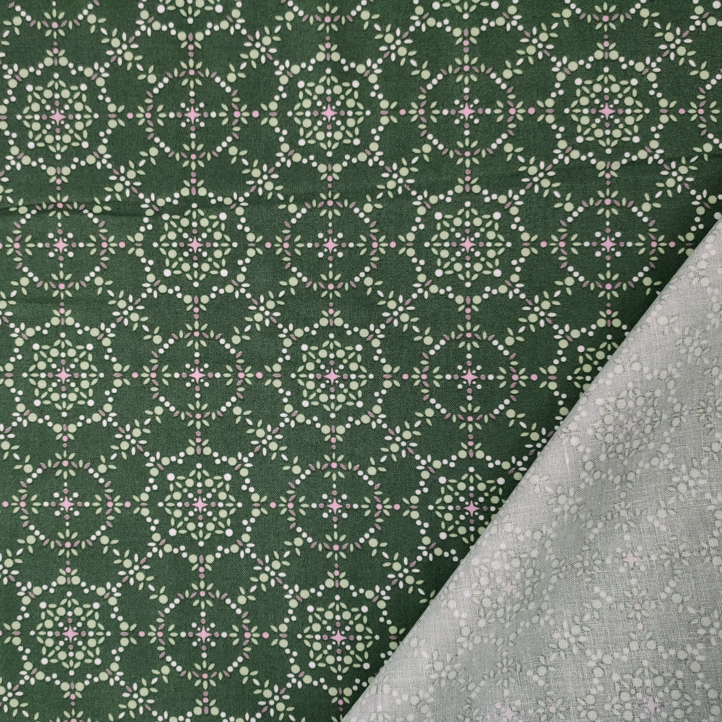 tessuto-cotone-magici-pois-verdi