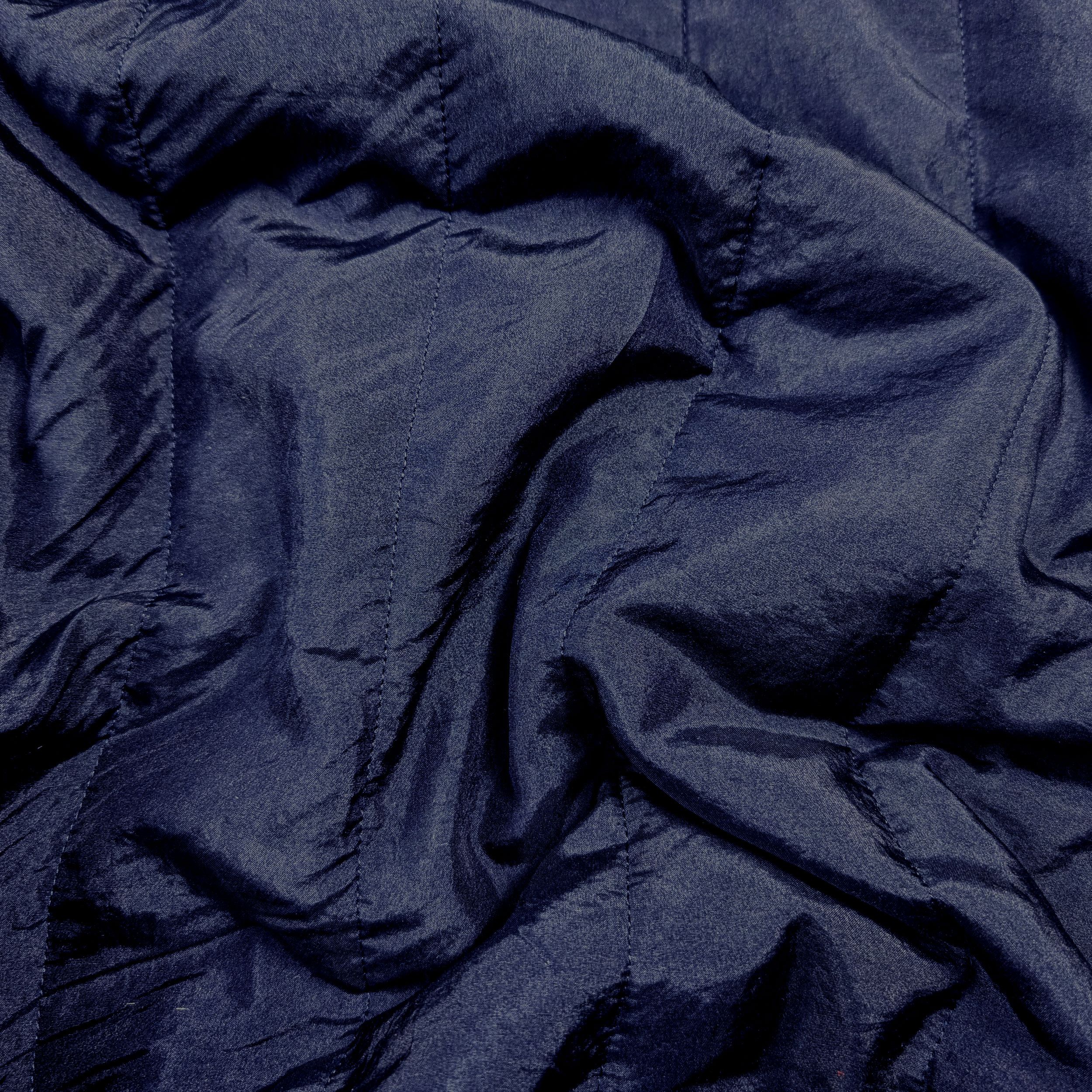 Trapuntato Blu Scuro con Retro in TNT Nero Image