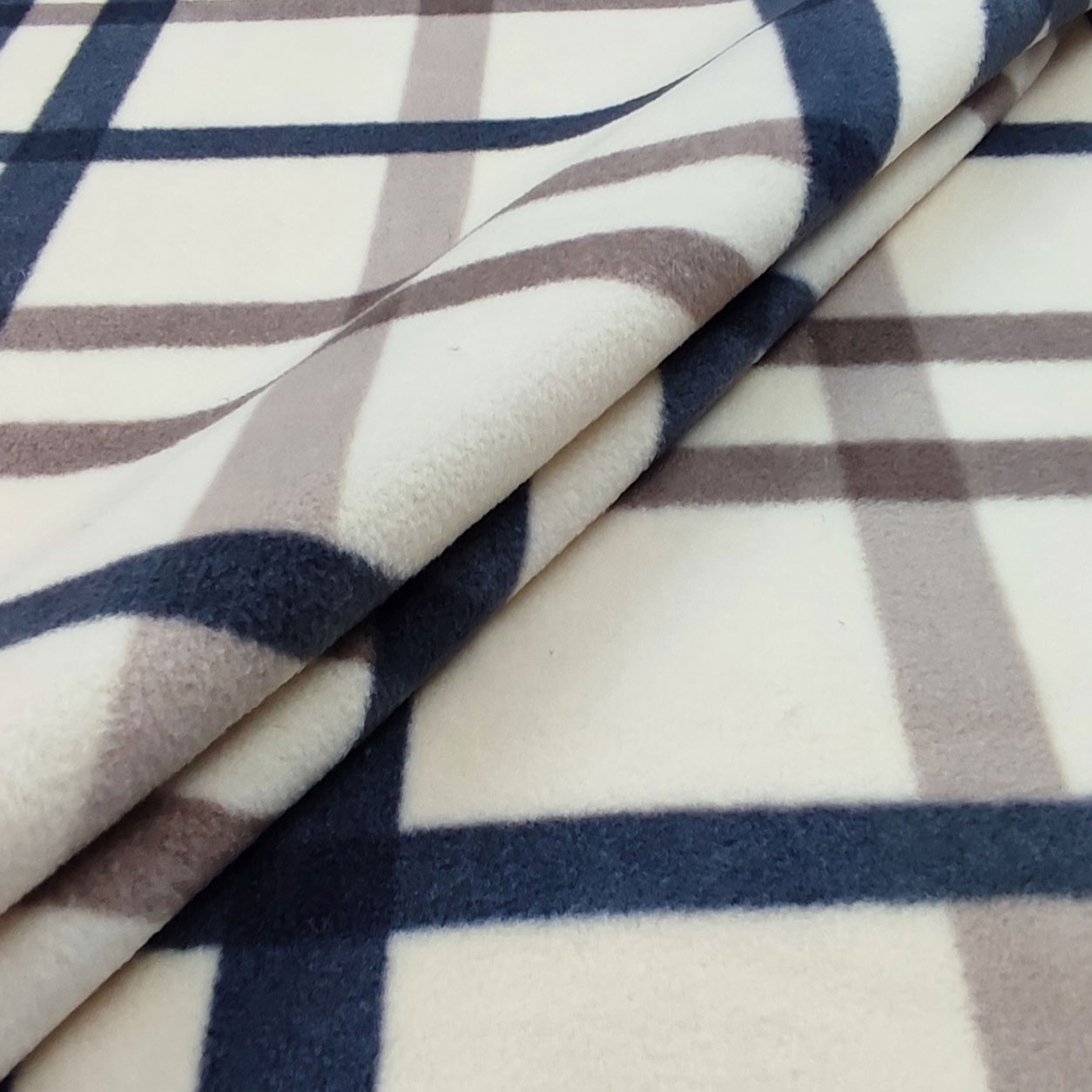 Stoffa pile quadri beige