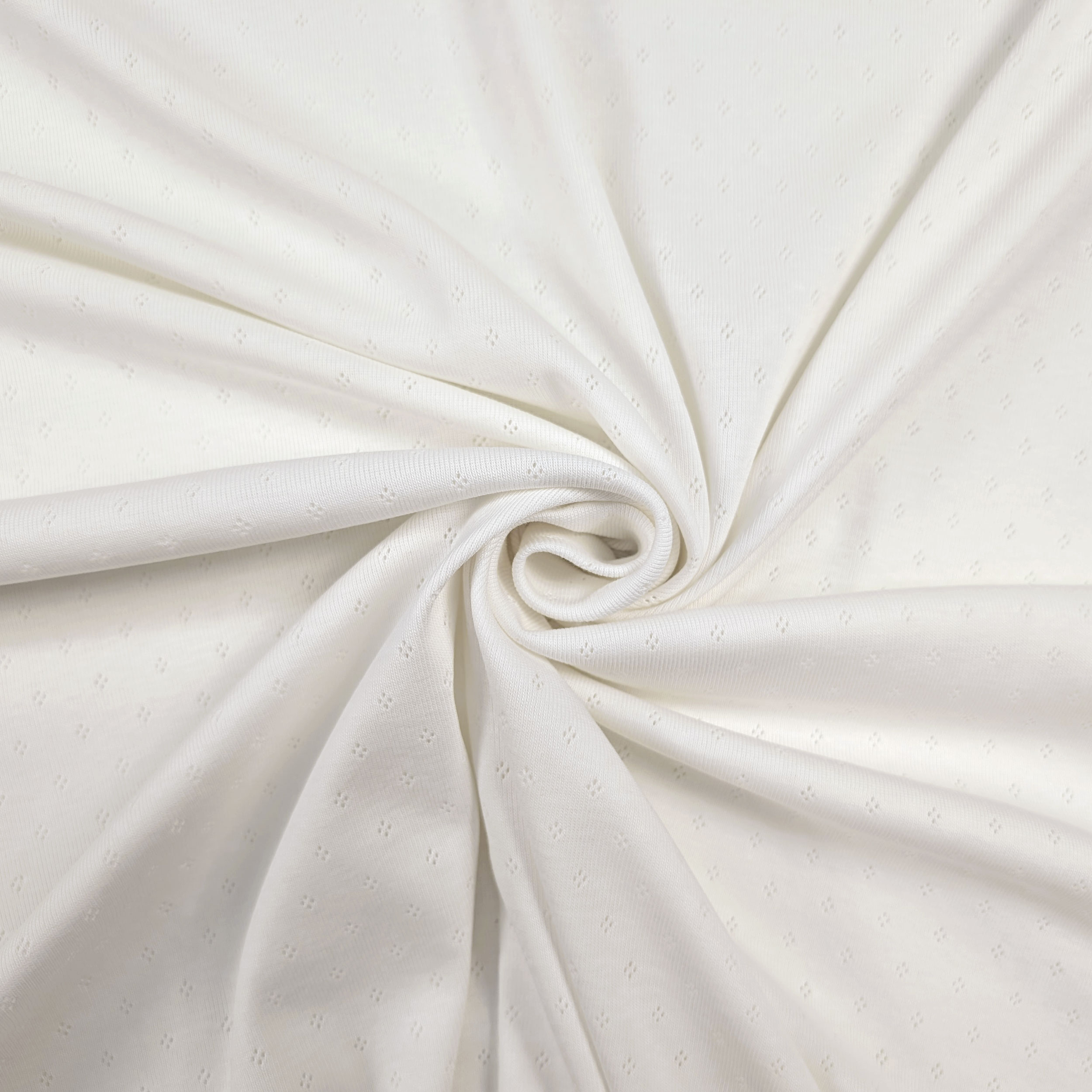 Jersey Cotone Fiori Traforati su Sfondo Bianco Image