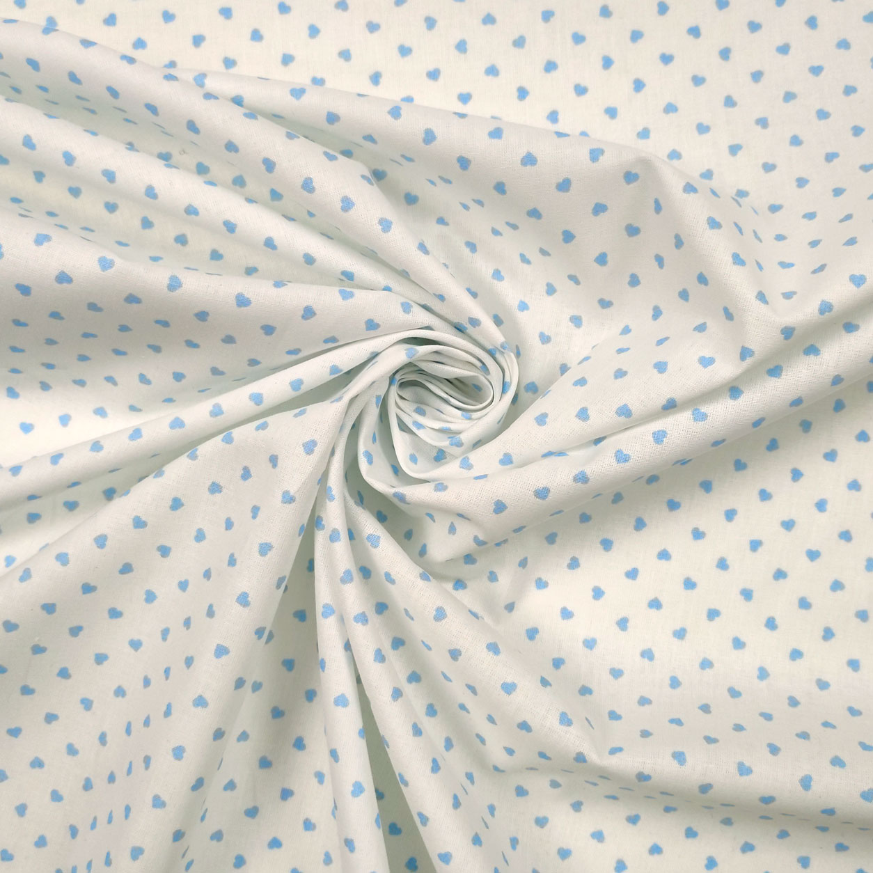 Tessuti cotone percallino bianco cuori colorati azzurro