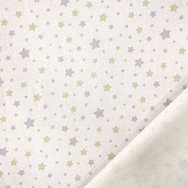 Tessuto Piquet di Cotone Fantasia Stelline Beige Image