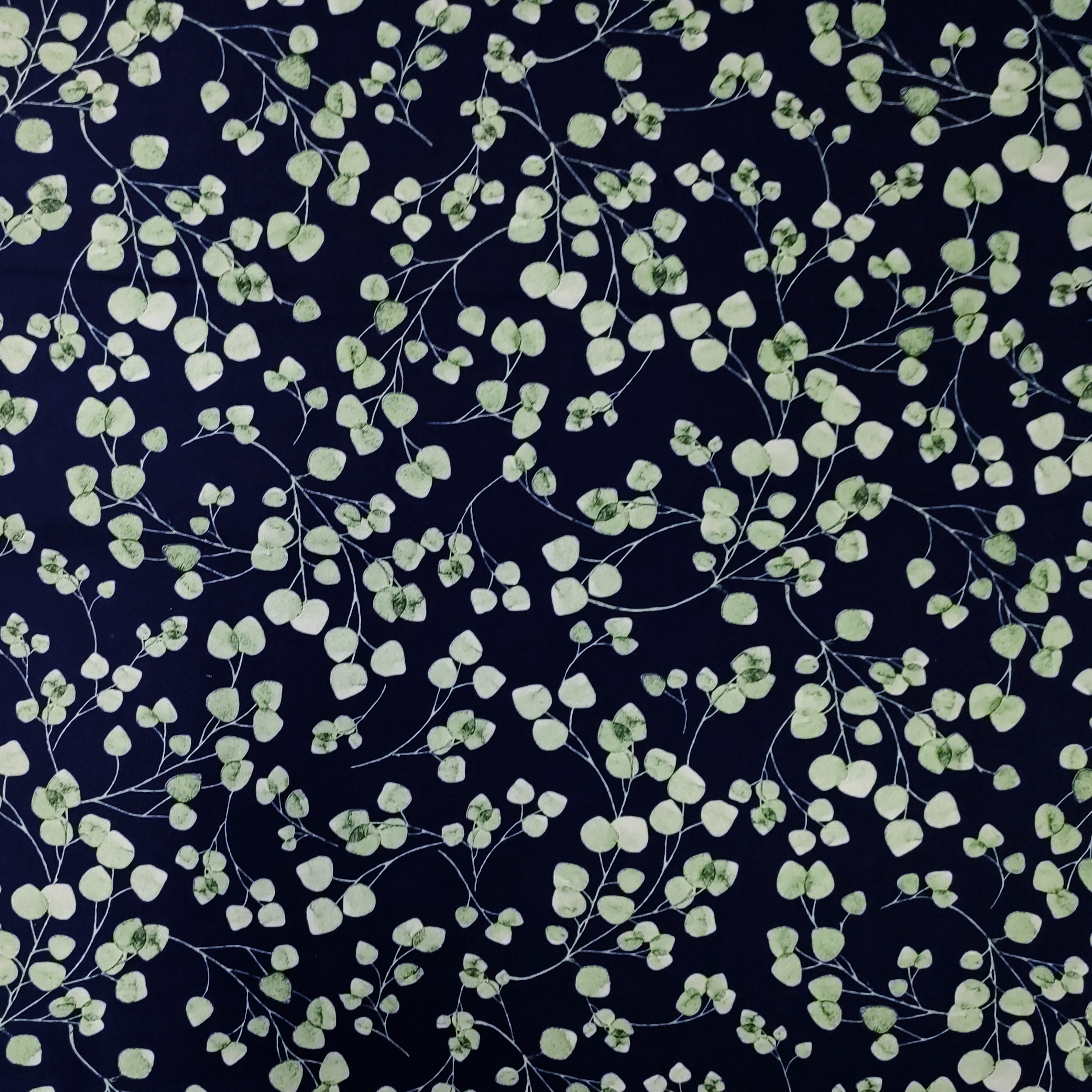 Tessuto cotone foglioline blu
