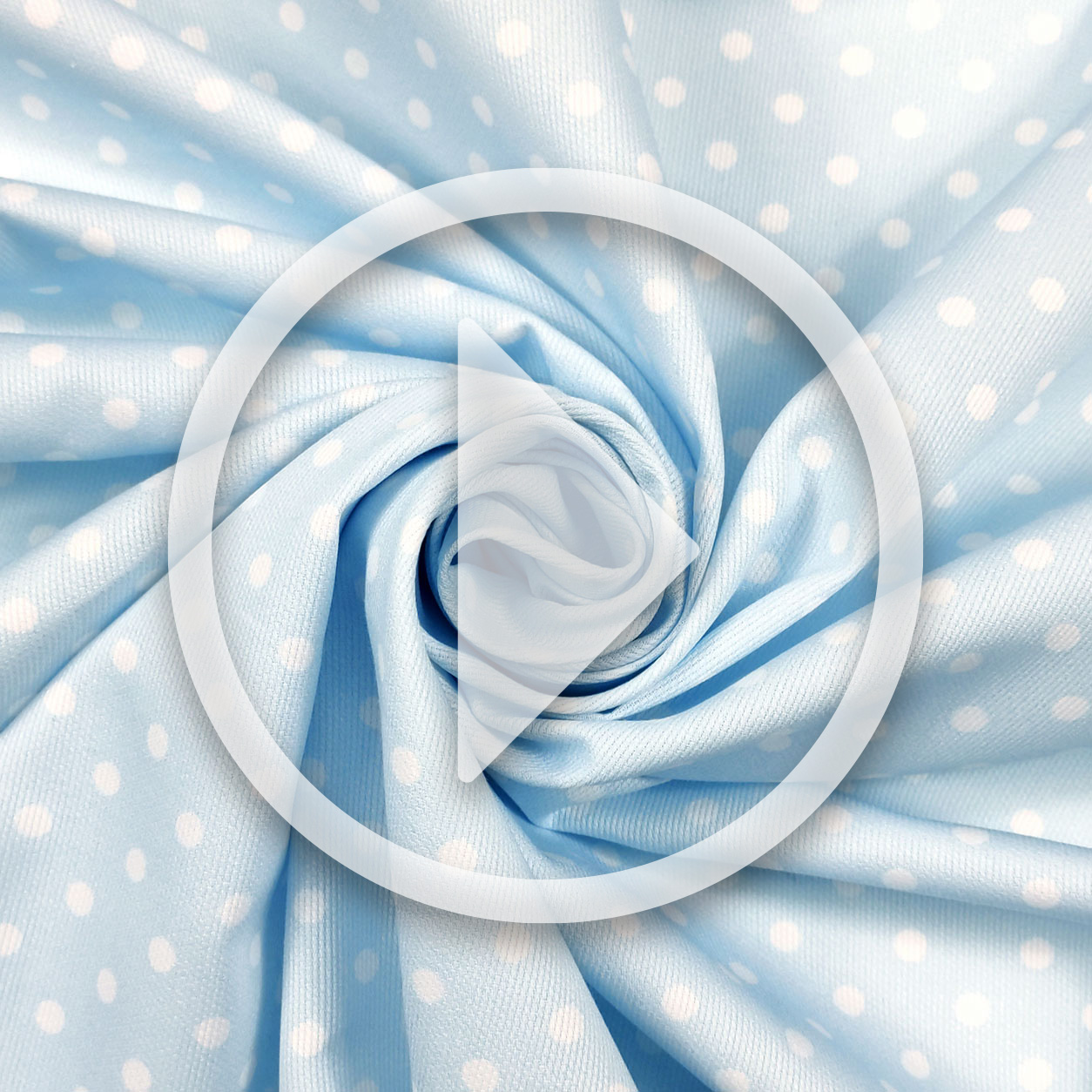 Tessuto piquet a pois bianchi sfondo azzurro