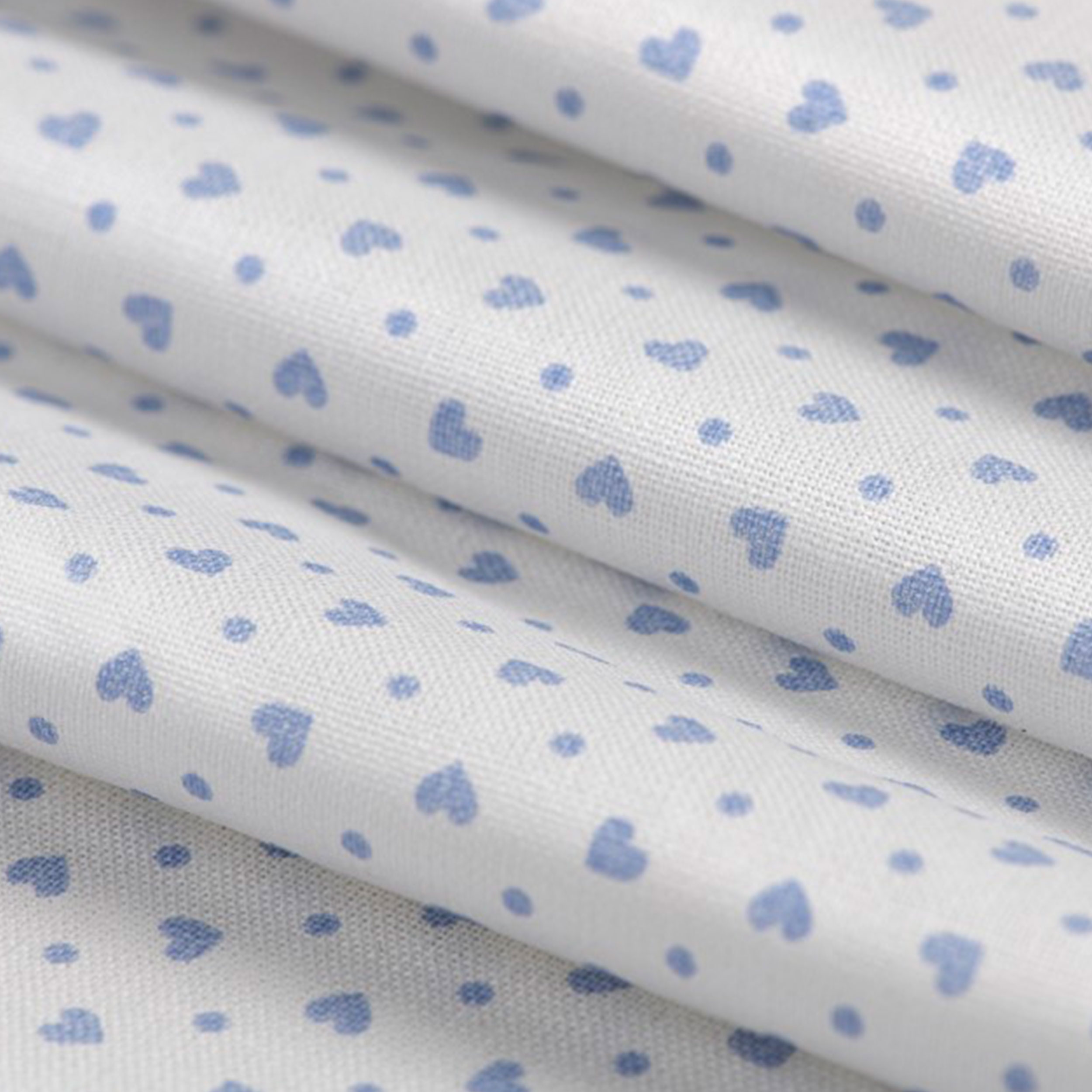 Tessuto Cotone con Cuoricini e Pois Celesti Image