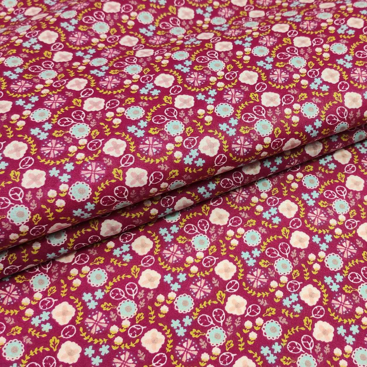 Tessuto cotone fiorellini sfondo fuxia scuro