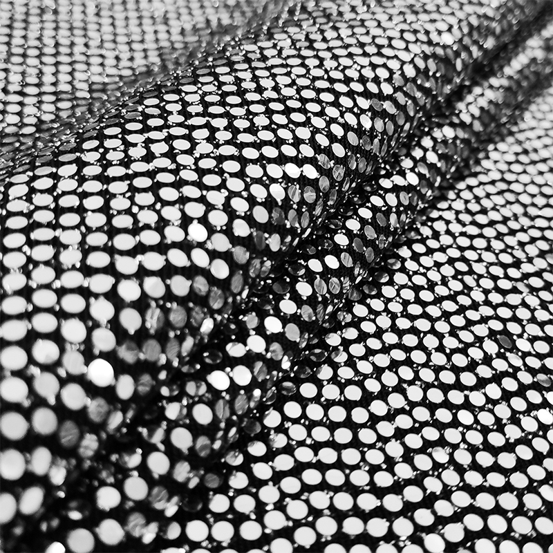 Tessuto elastico con pailettes argento