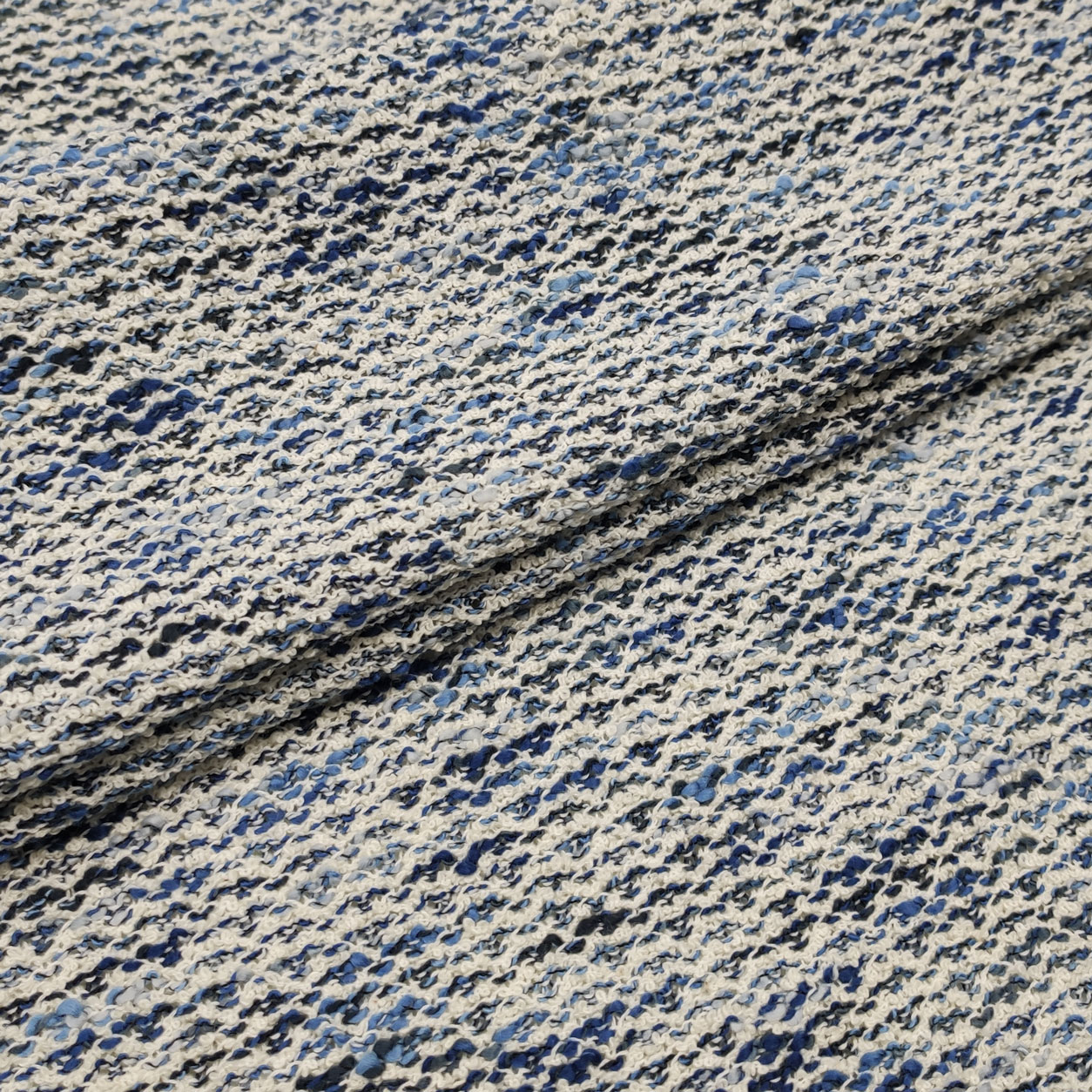 Scampolo tessuto effetto maglia melange blu