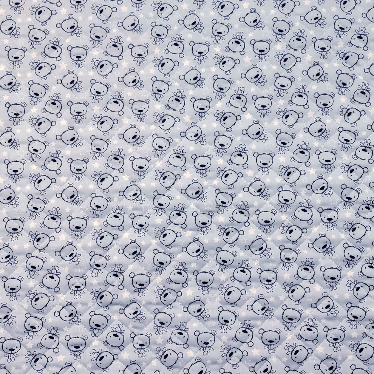tessuto-trapuntato-cotone-orsetti-sfondo-azzurro