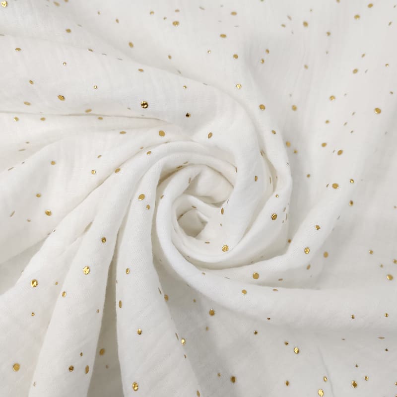 Mussola Cotone Bianco con Pois Oro