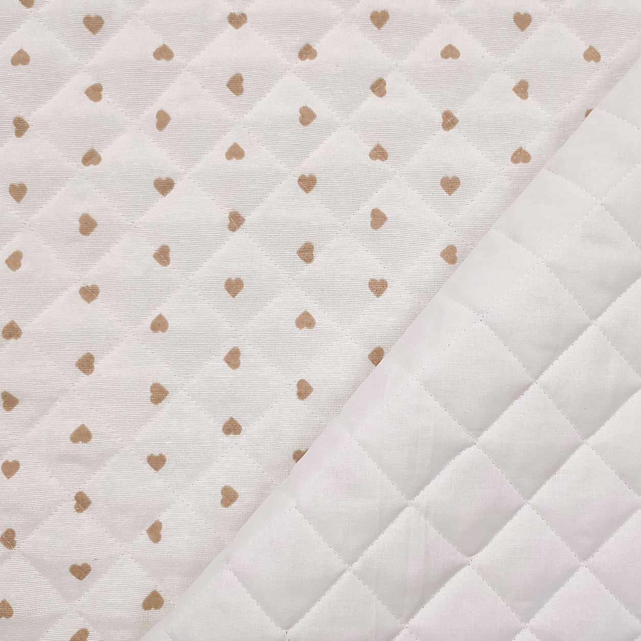 Stoffe trapuntate al metro cuoricini beige