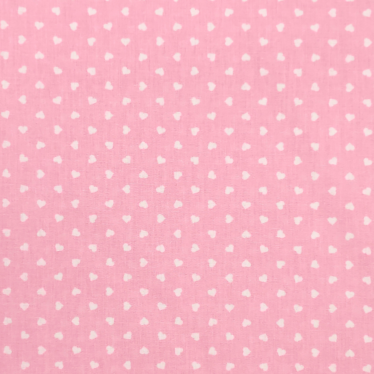 Tessuto cotone percallino cuori bianchi sfondo rosa