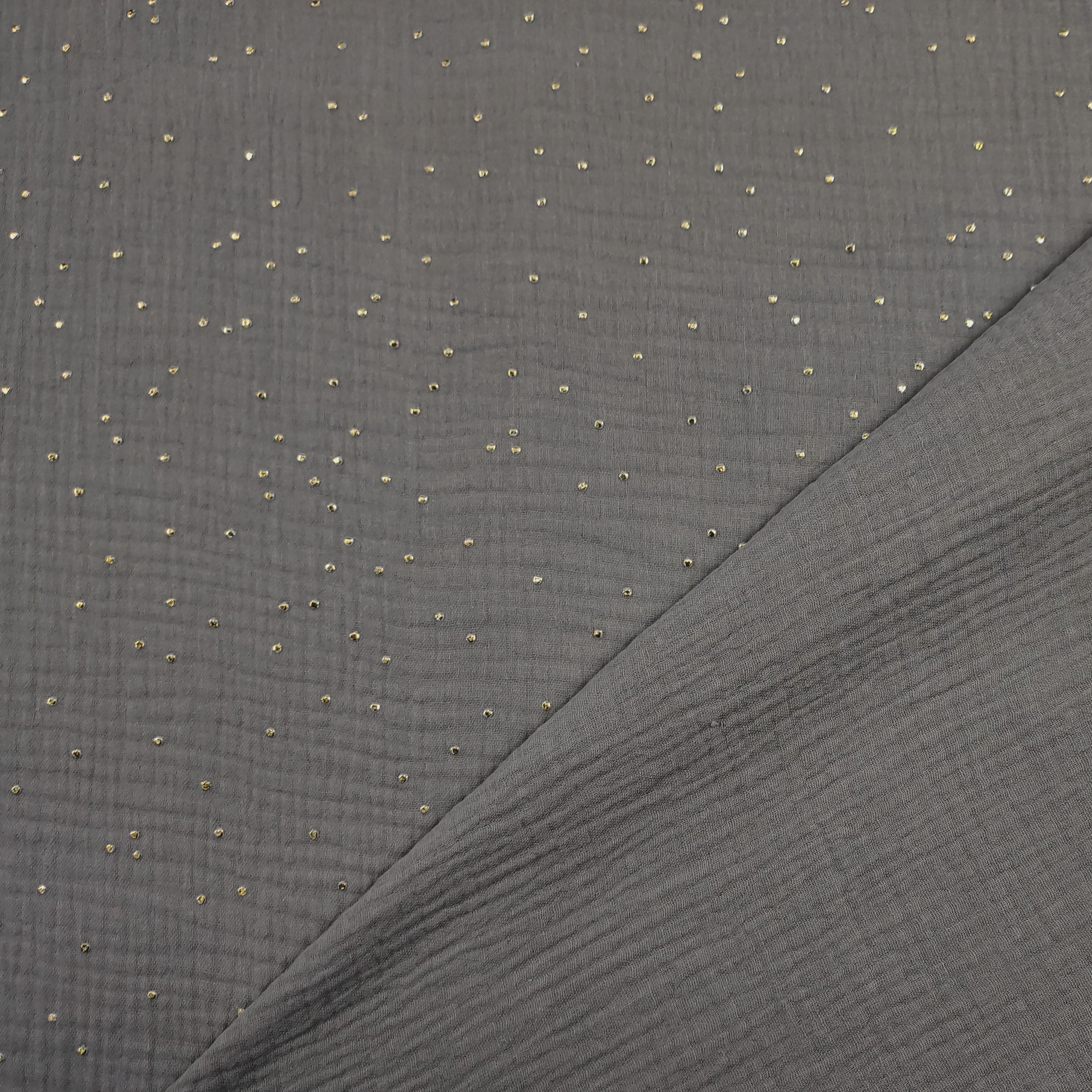 Mussola Cotone Grigia con Pois Oro