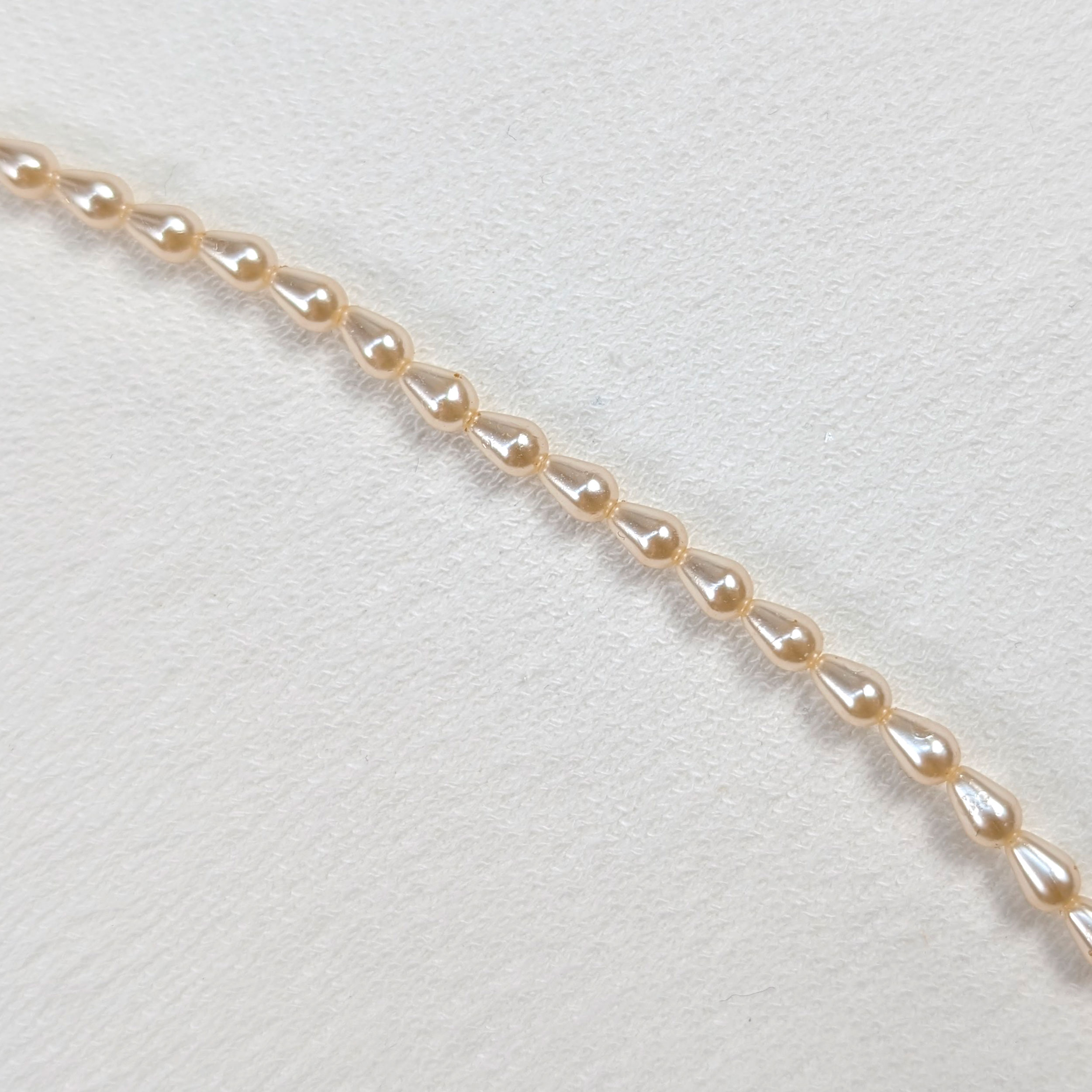 Filo di Perline Beige 0,4x0,6 cm Image