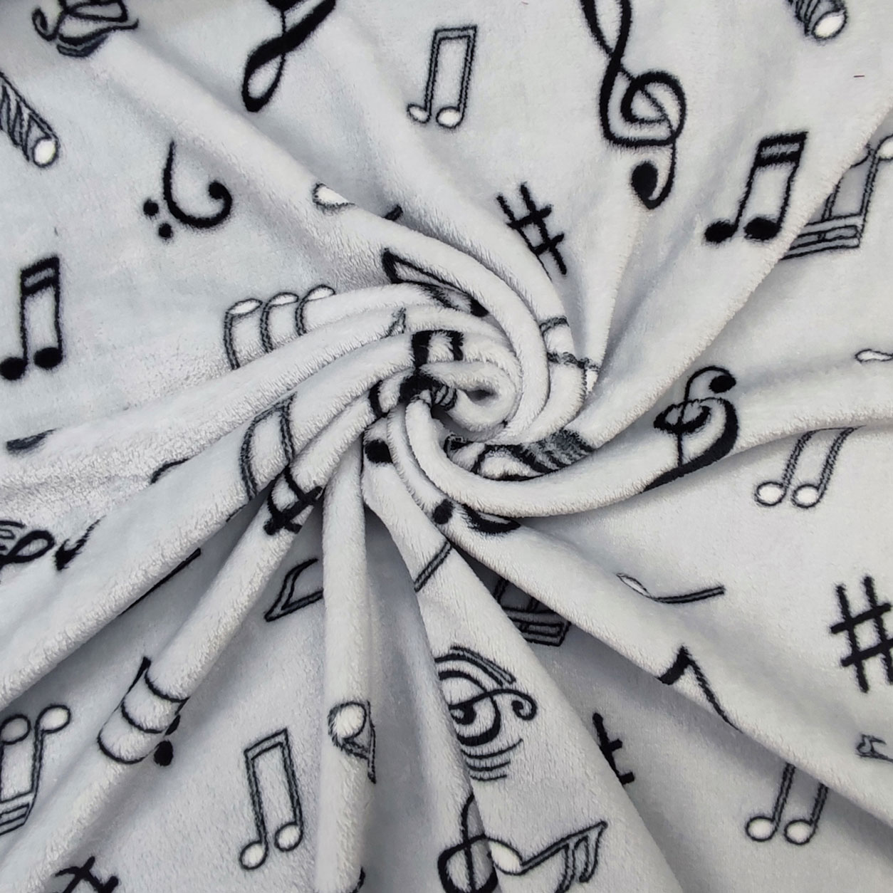 Stoffa pile note musicali grigio