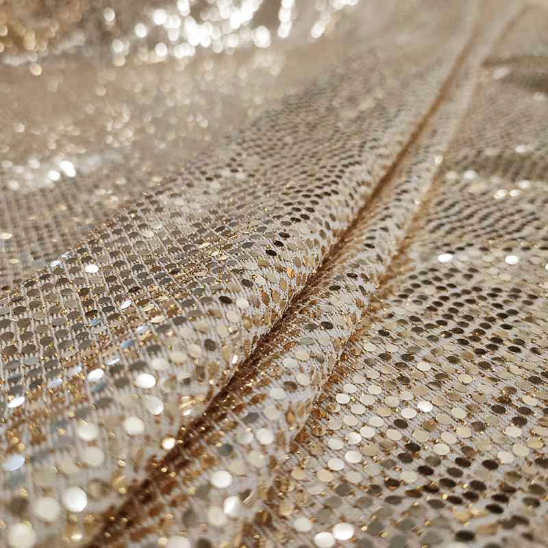 stoffa-con-paillettes-oro
