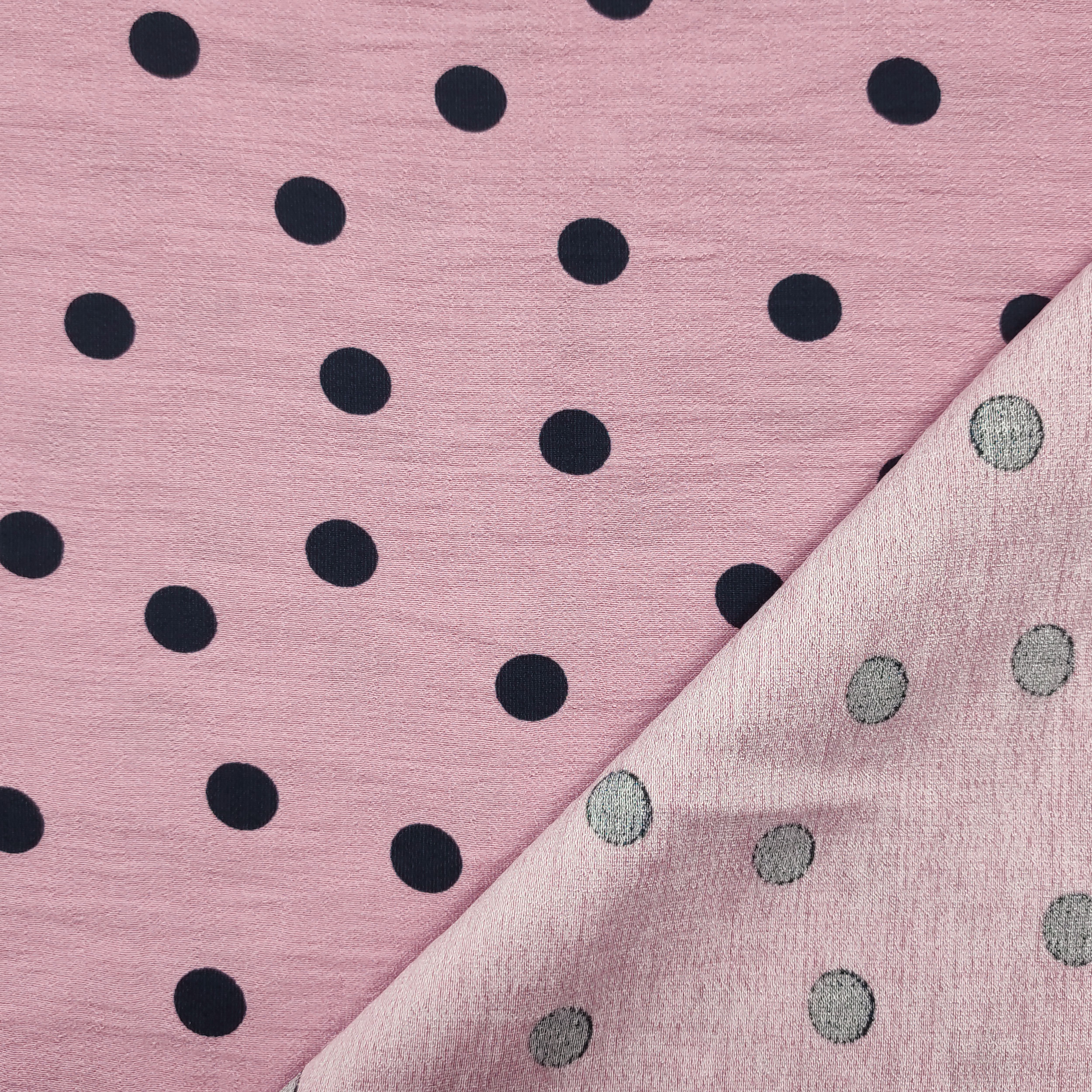Tessuto Crêpe Viscosa Rosa con Pois