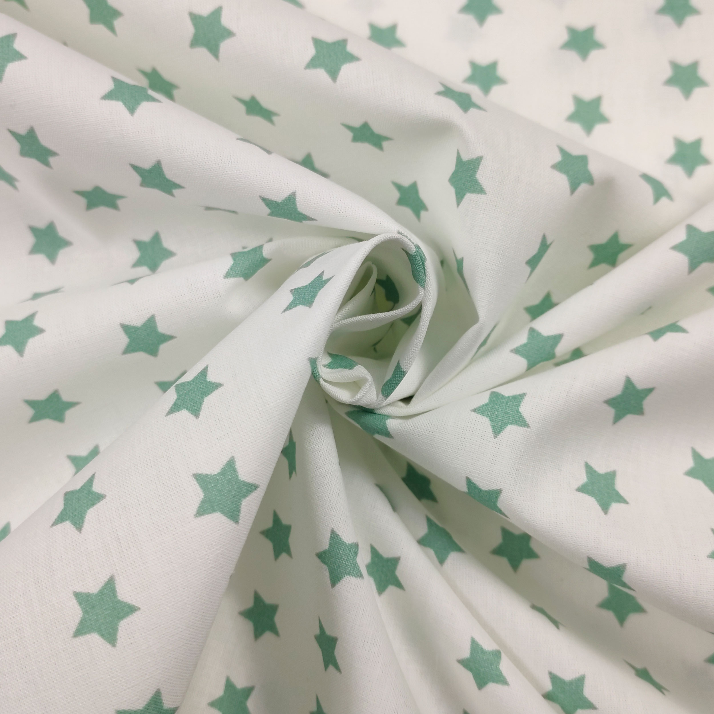 tessuto online stelle verde marino sfondo bianco