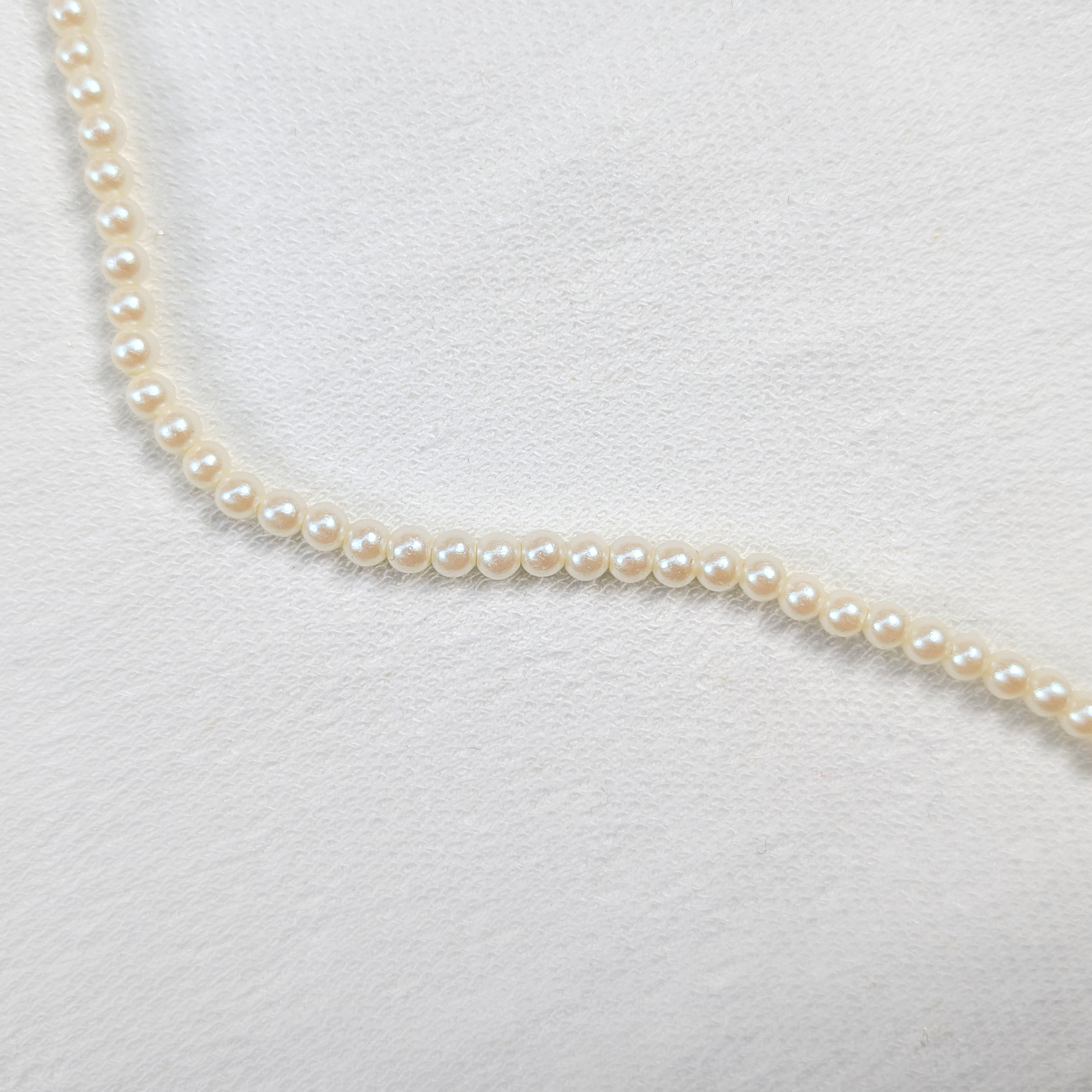 Filo di Perline Beige Ø 0,4 cm Image