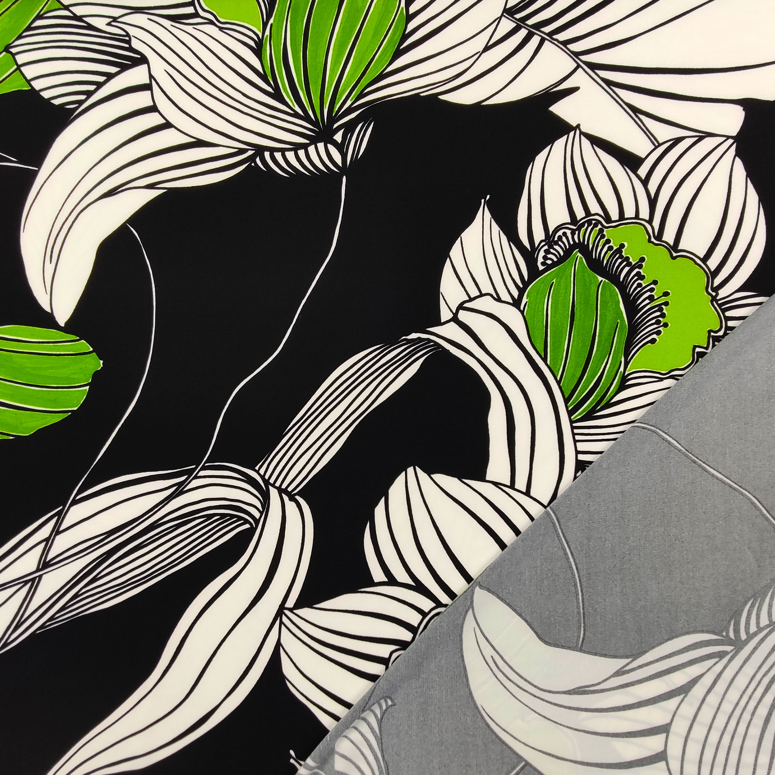 tessuto elastico fiori grandi bianchi e verdi sfondo nero