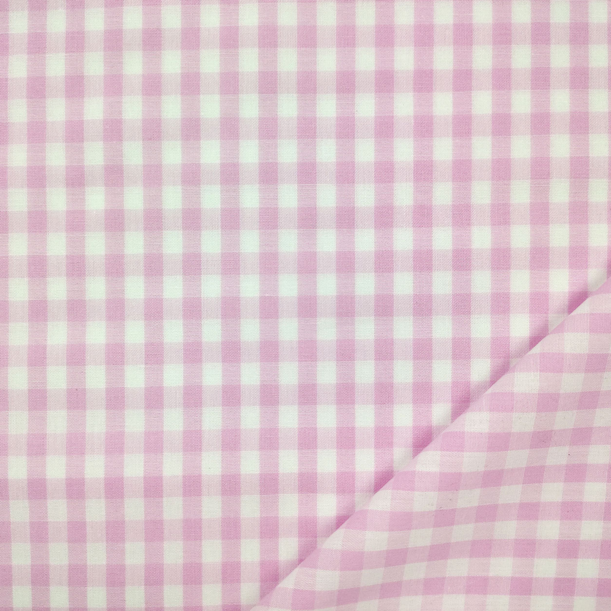 Tessuto cotone leggero quadretto grande tinto in filo rosa chiaro