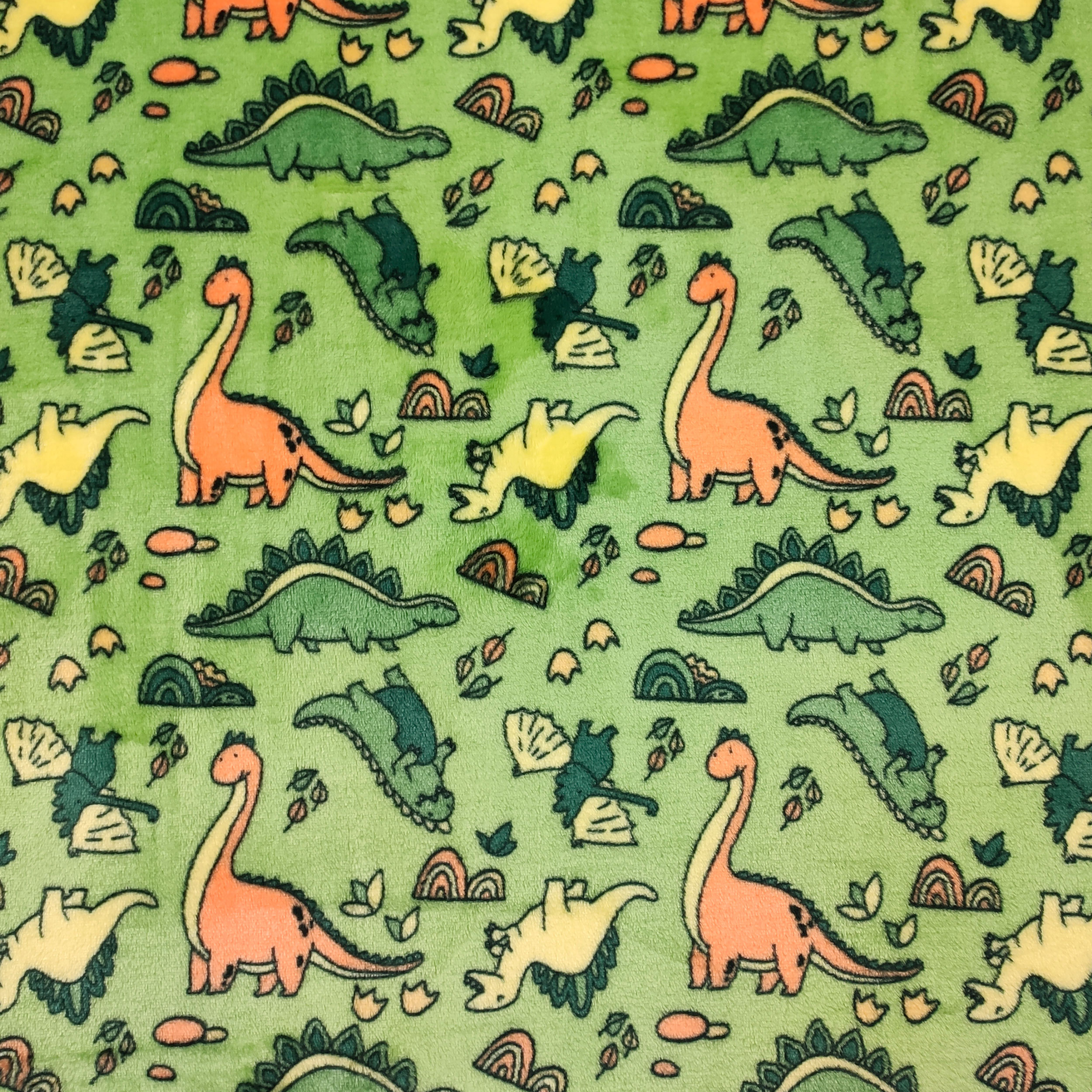 stoffa-pile-dinosauri-sfondo-verde