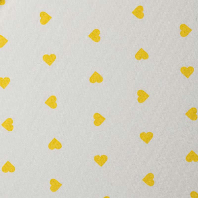 tessuto-di-cotone-con-cuori-giallo