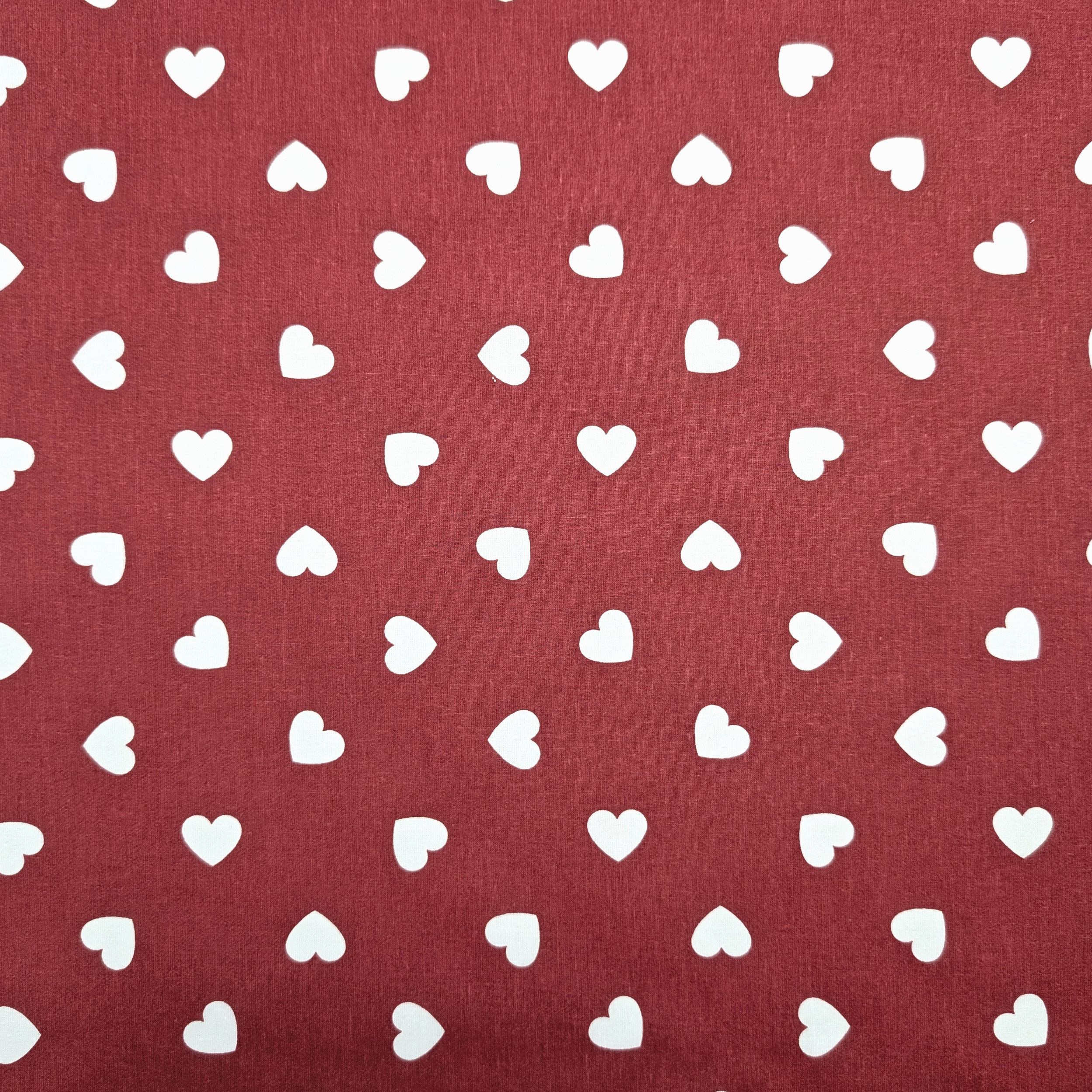 Cotone Cuori Bianchi con Sfondo Rosso Image
