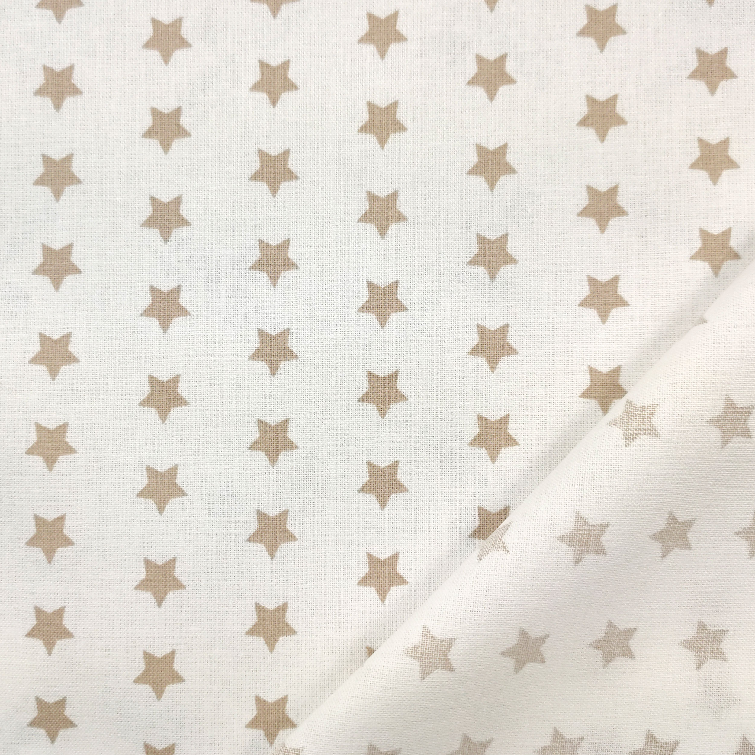 cotone con stelle beige sfondo bianco