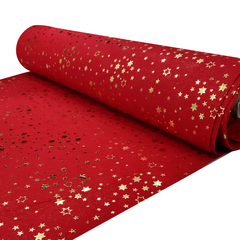 Pannolenci stelle oro al metro in rosso