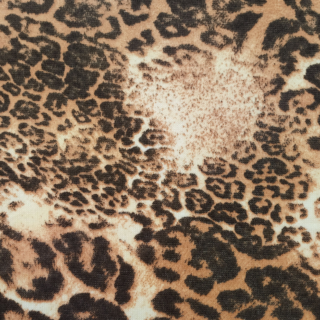 tessuto-maglina-leopardata-beige-nero