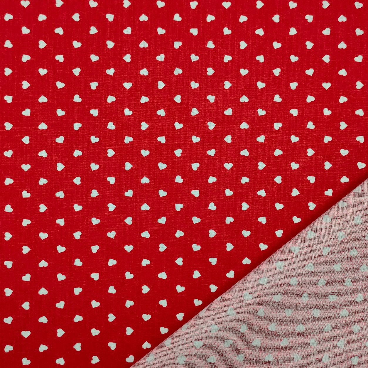 Tessuto cotone leggero percallino cuori bianchi sfondo rosso