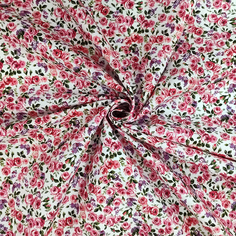 Tessuti coton con roselline rosa