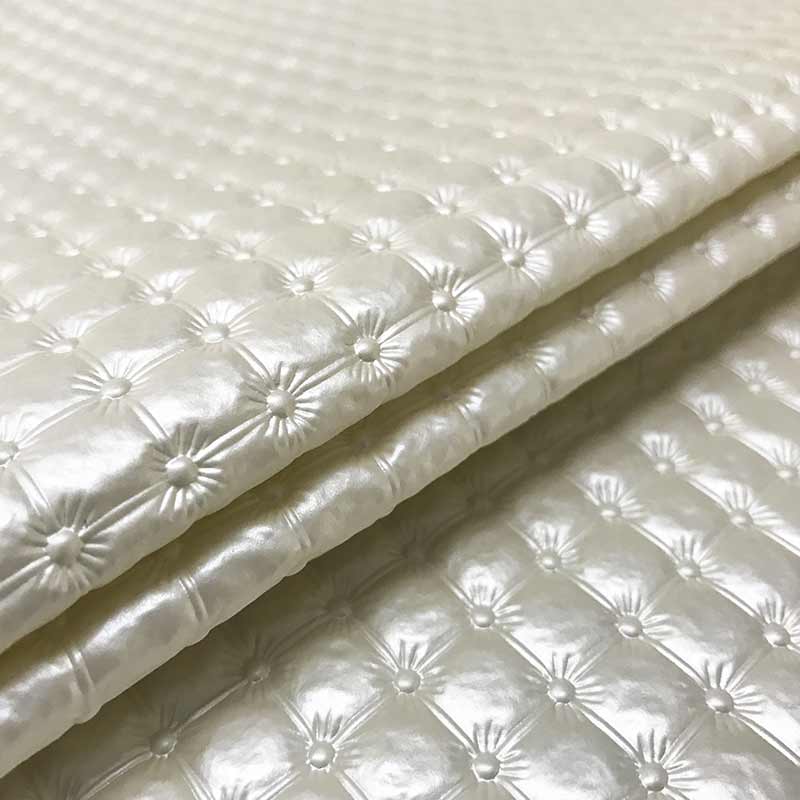 Tessuto-Ecopelle-Effetto-Matelassè