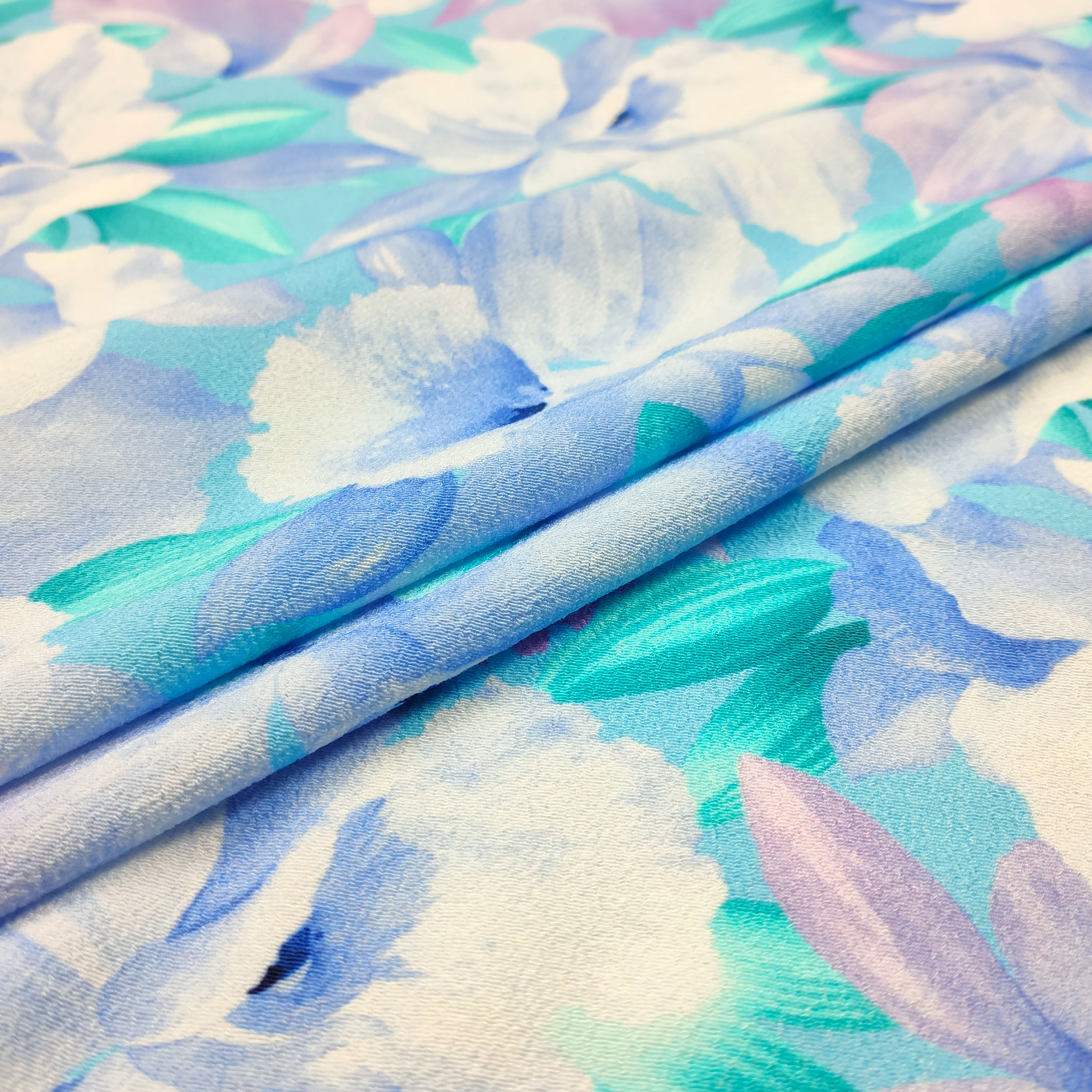 tessuto per abbigliamento fiori azzurri