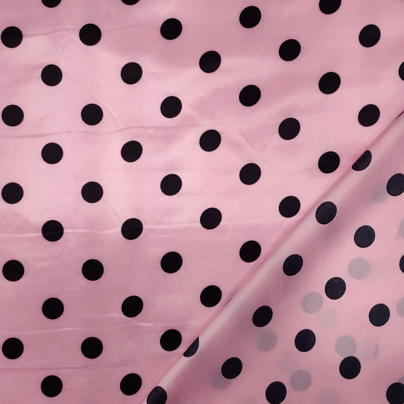 Tessuto per carnevale pois neri sfondo rosa
