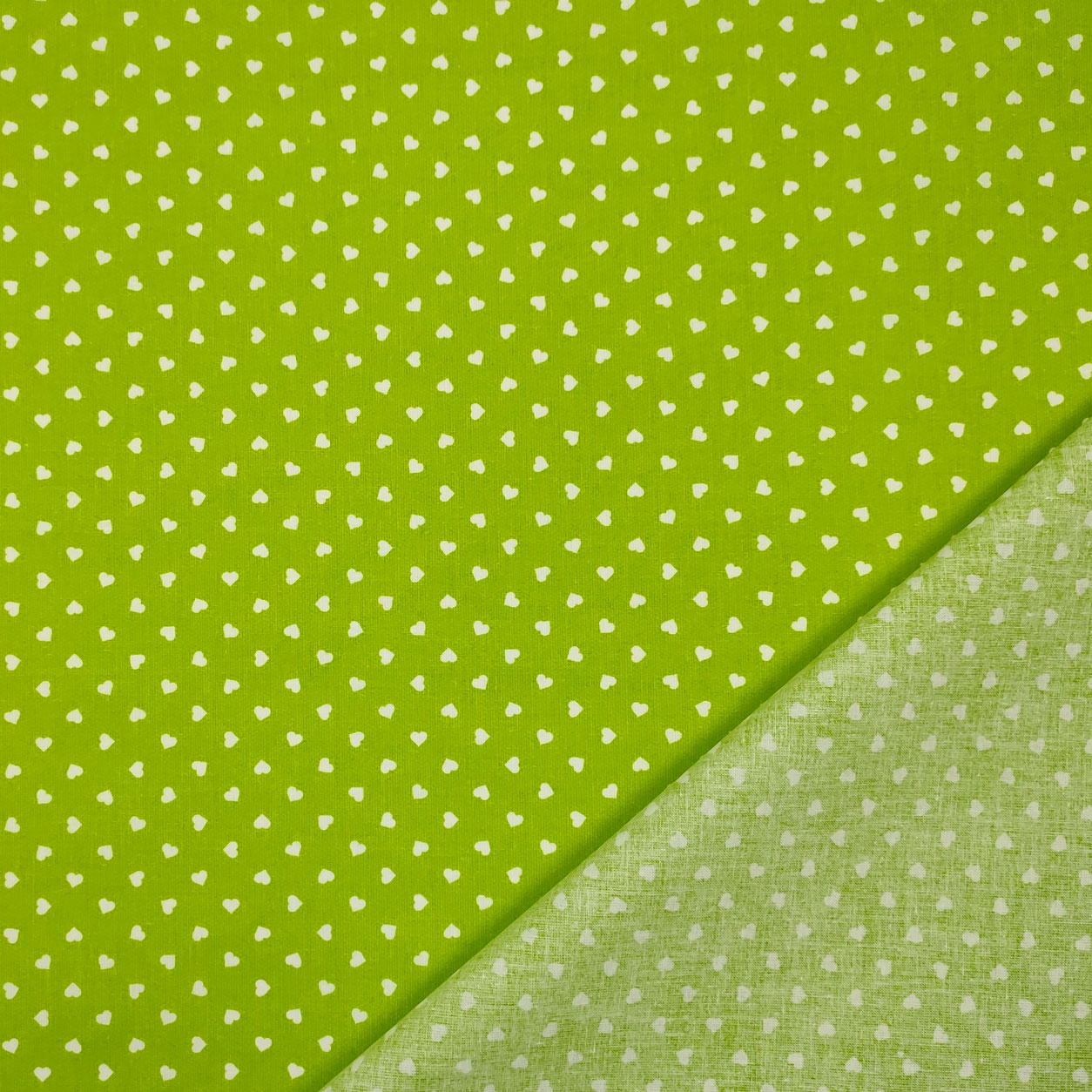 Tessuto cotone leggero percallino cuori bianchi sfondo verde