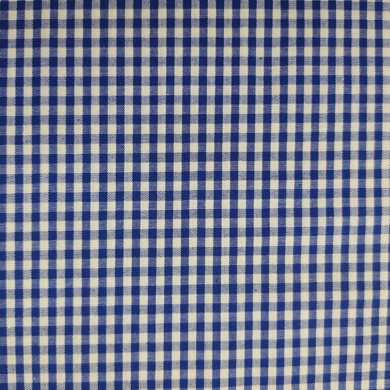 Tessuto cotone quadretti medi tinto in filo blu