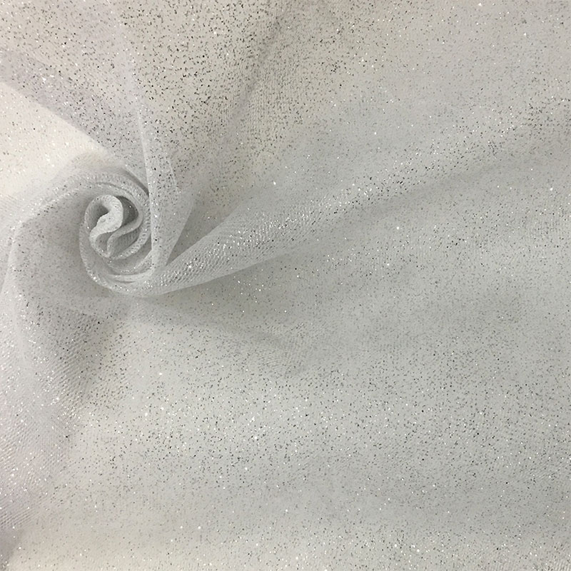 stoffa-tulle-brillantini-bianco