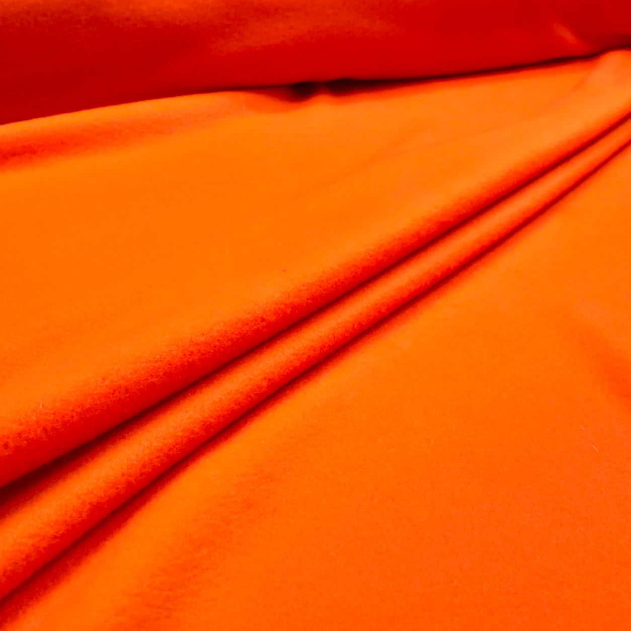 tessuto pile tinta unita arancio