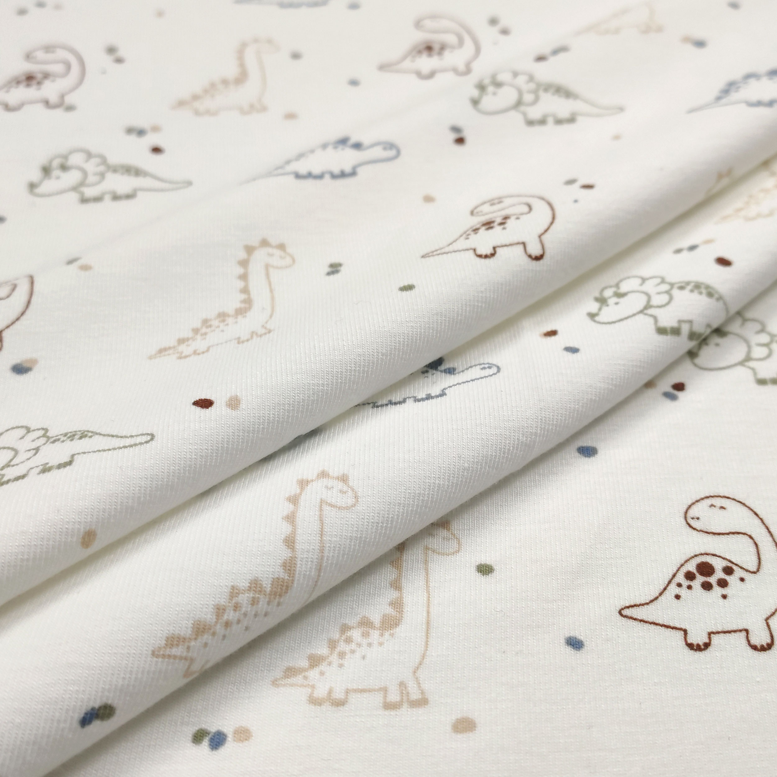 Tessuto Jersey Cotone Dinosauri